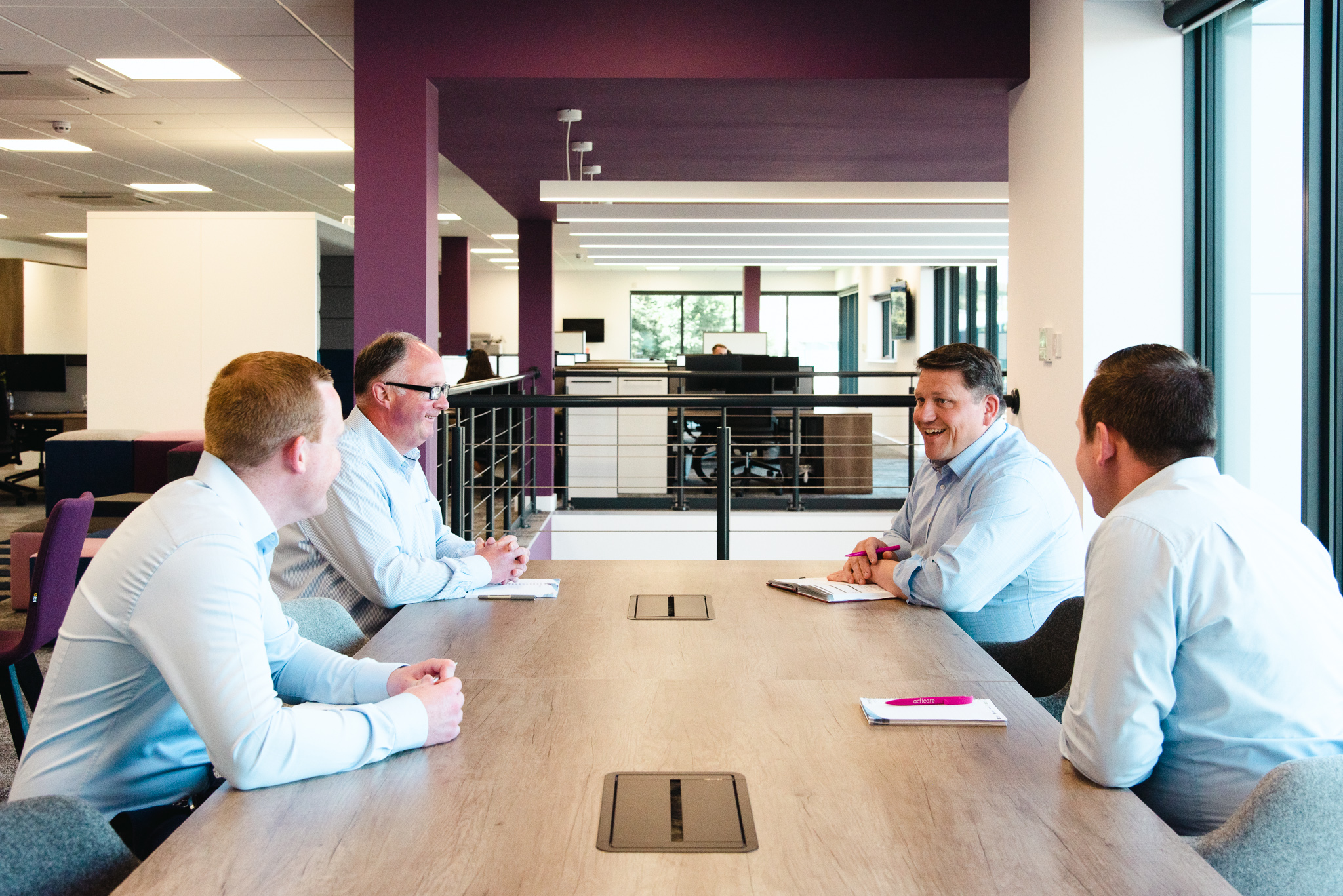 Meeting between 4 co-workers