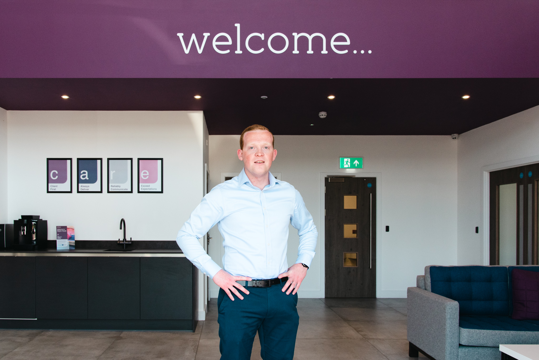 Acticare staff member standing in reception