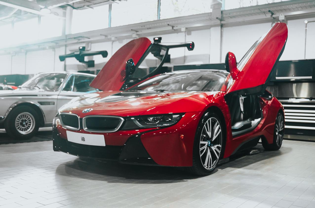 Red BMW I8 with doors open
