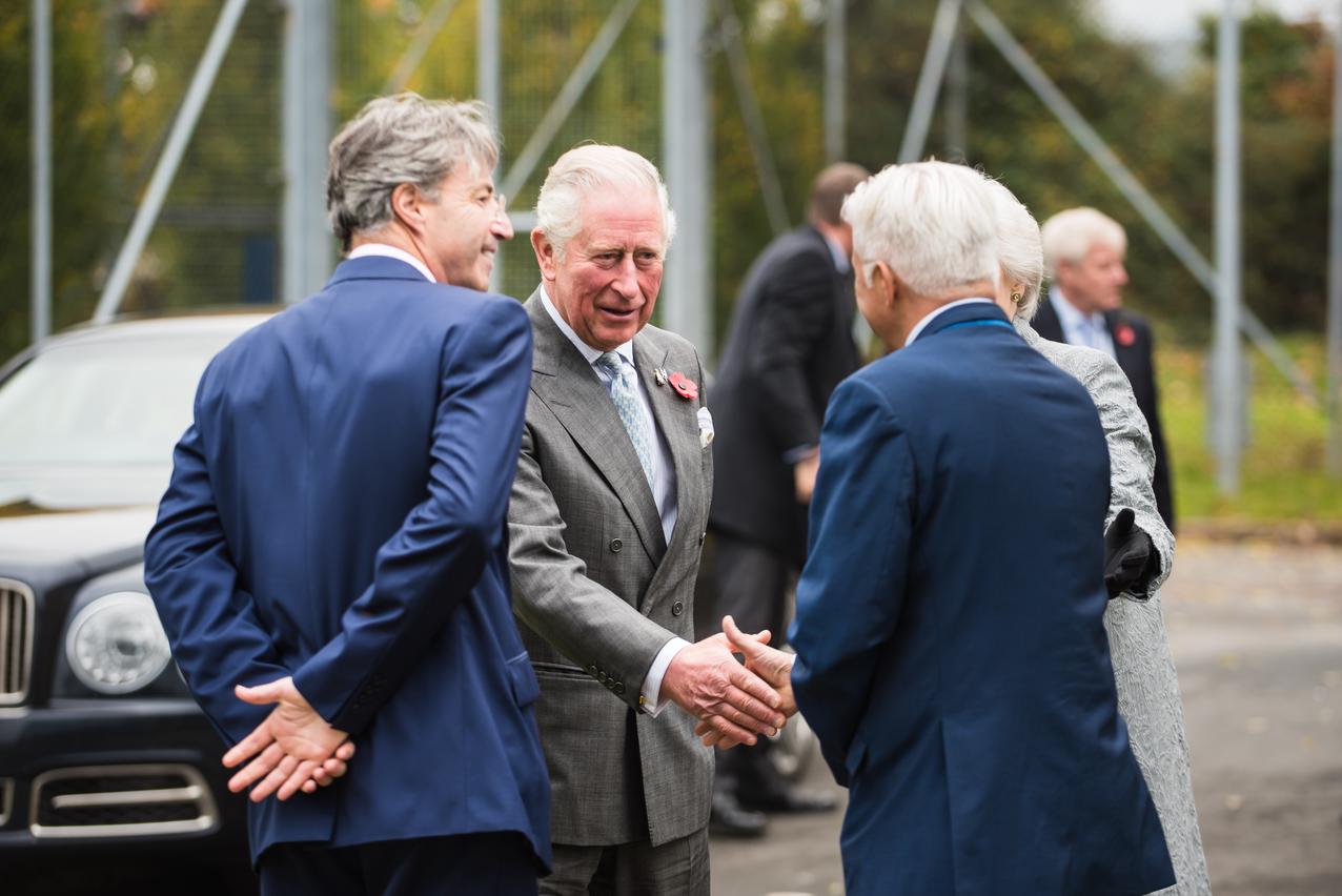Prince Charles shaking hands