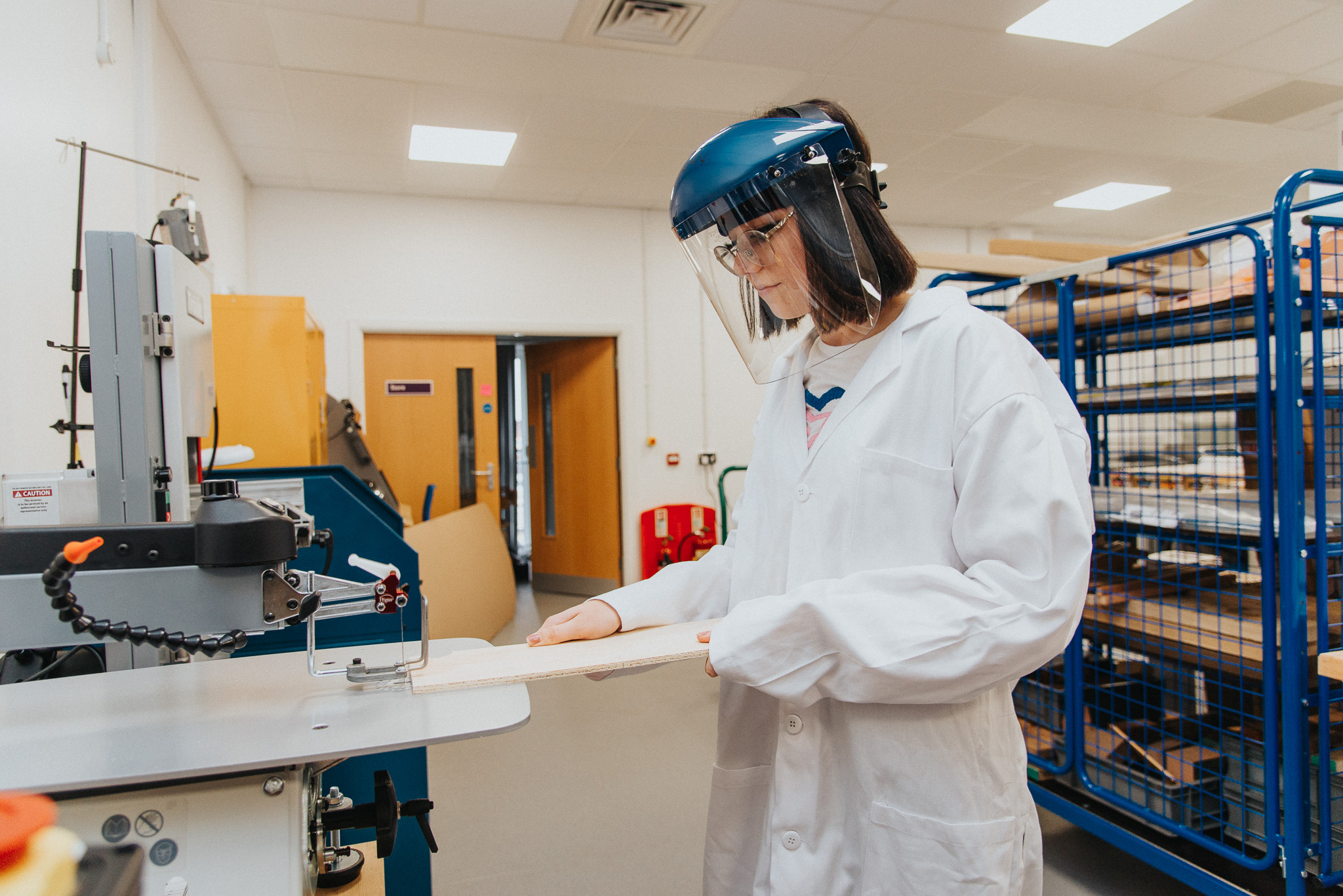 Promotional Photography - Students working with machine