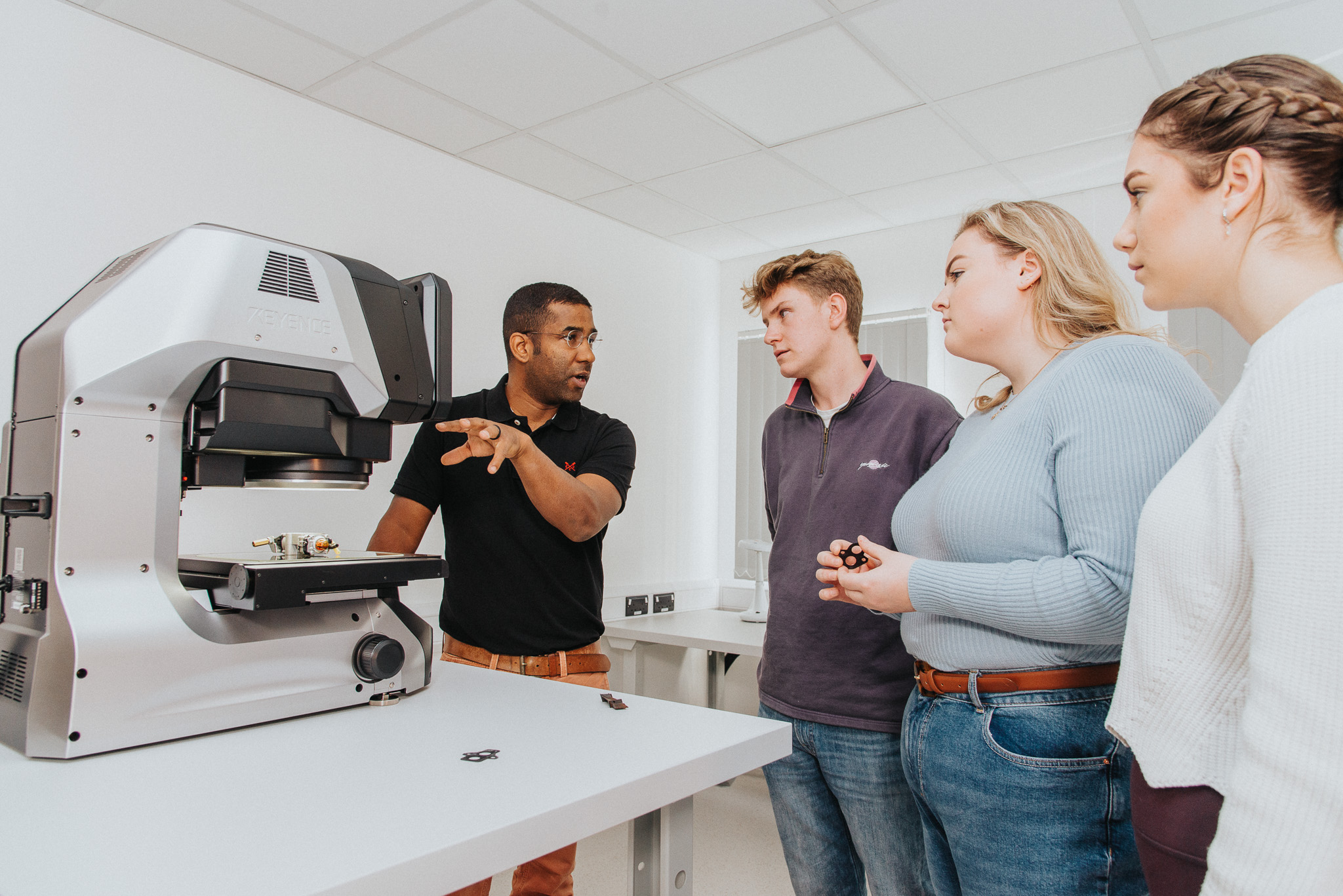 Promotional Photography - Students talking with teacher