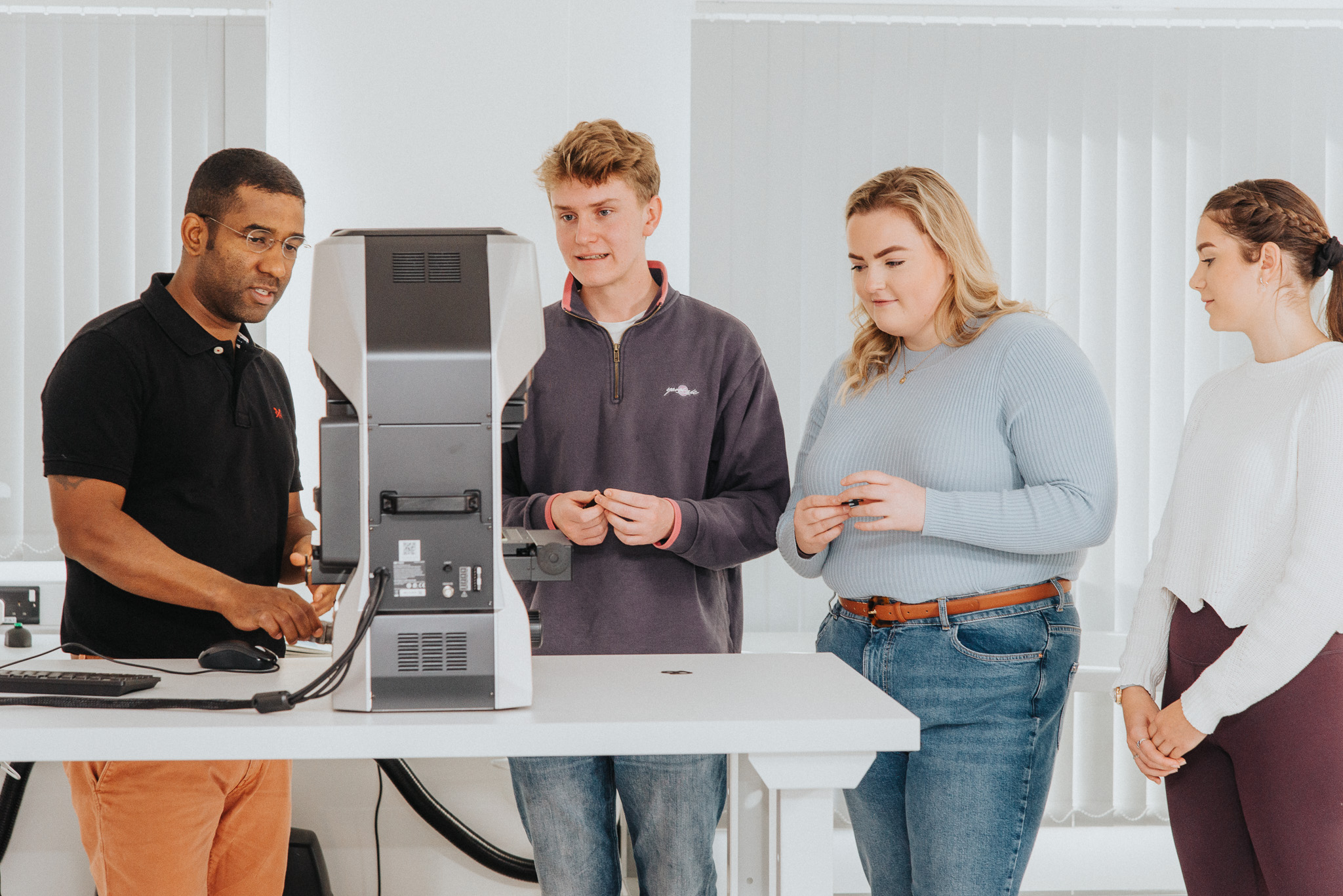 Promotional Photography - Students talking with teacher