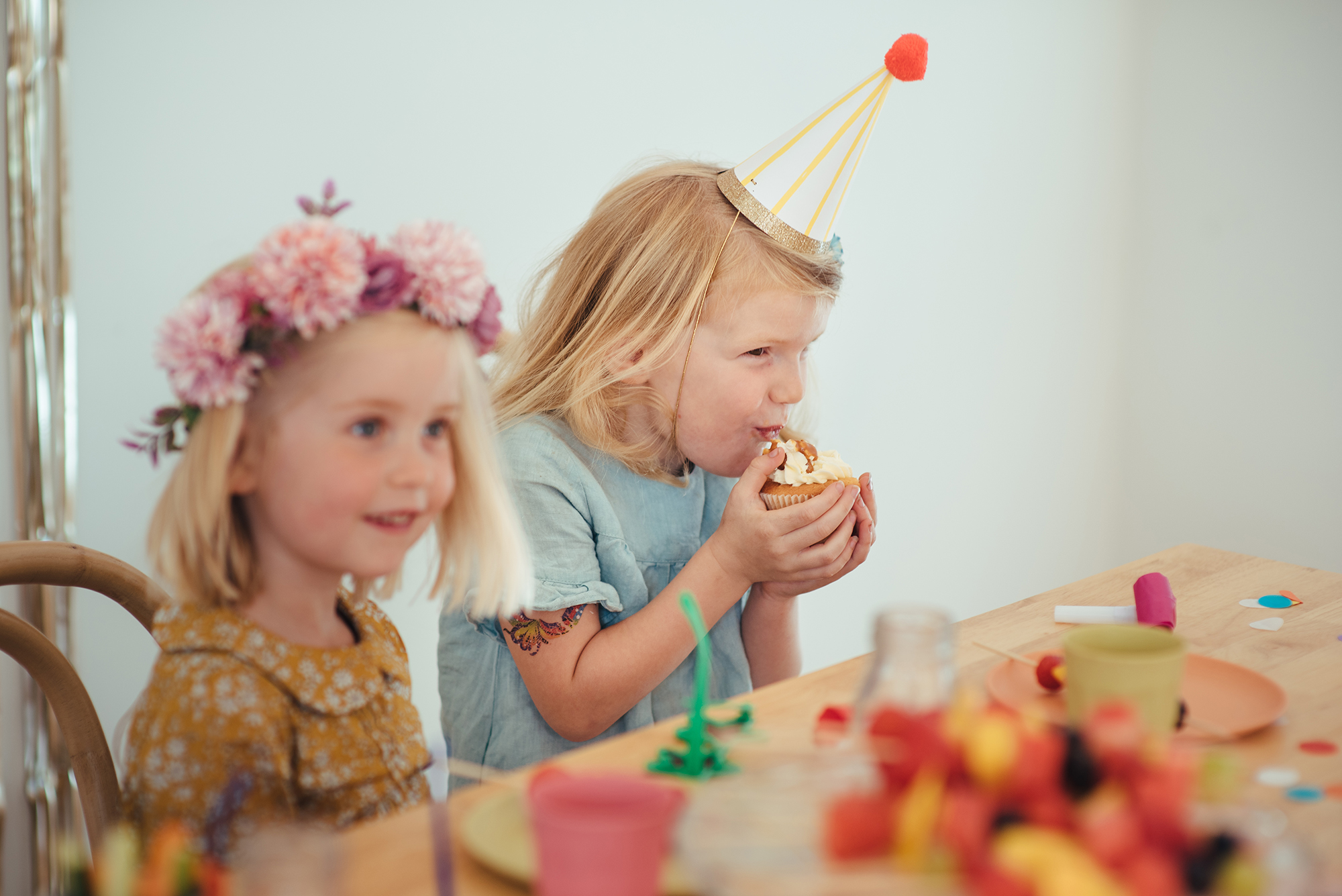 Two children drinking